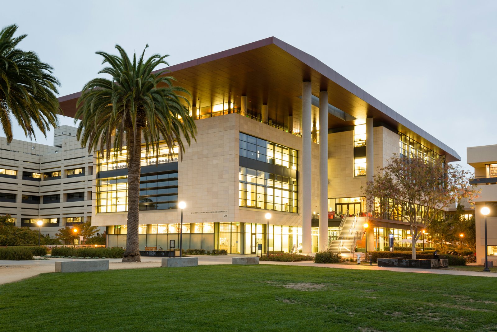 A modern research centre lit after dark